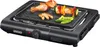 Der Unold 58565 Barbecue-Grill Vario in Schwarz grillt Hähnchenschenkel, Würstchen und Gemüsespieße  Produktbild-Vorschau