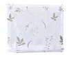 A white sheer curtain with a floral pattern. Produktbild-Vorschau