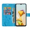 A blue flip phone case with card slots and a phone inside, displaying a colorful abstract wallpaper. Produktbild-Vorschau