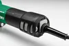 Close-up of the handle and motor housing of a green and black power tool. Anteprima dell’immagine prodotto