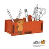 A cartoon mouse character is depicted on an orange pencil holder filled with various stationery items. Produktbild-Vorschau