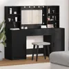 A black vanity set with a mirror and lights, a stool, and some decorative items on shelves. Náhled obrázku produktu