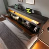 A modern upholstered bed frame with integrated storage and lighting. Produktbild-Vorschau