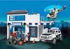A Playmobil police station playset with a police car, helicopter, and figures. Produktbild-Vorschau