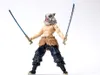 A figure of Inosuke Hashibira from Demon Slayer, holding two swords. Náhled obrázku produktu
