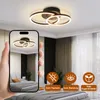 A modern LED ceiling light with two rings is shown in a bedroom setting, with a smartphone displaying the same light in the foreground. There are also icons indicating product features. Anteprima dell’immagine prodotto