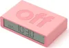 A pink flip alarm clock is shown from a slightly elevated diagonal angle against a white background. The clock displays the time 10:30. Náhled obrázku produktu