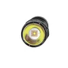A close-up, top-down view of the front of a black flashlight, showing the LED light and reflector. Produktbild-Vorschau