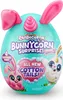 A Rainbocorns Bunnycorn Surprise Series 2 toy egg with bunny ears and a horn, featuring cartoon bunnies on the packaging. Anteprima dell’immagine prodotto