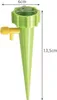 A green plant watering spike with yellow valve, shown against a white background with dimensions indicated. Anteprima dell’immagine prodotto