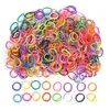 A pile of colorful rubber bands for making bracelets, with a separate row of individual bands shown below. Podgląd zdjęcia produktu