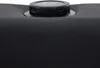 A close-up view of a black wireless charging pad with USB ports embedded in a black textured surface. Náhľad obrázku produktu