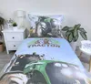 A bed set with a tractor theme is displayed on a bed next to a nightstand. Náhled obrázku produktu