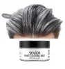 A close-up of gray hair colored with hair wax, with a jar of the product below. Náhled obrázku produktu