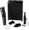 A collection of grooming tools and accessories, including a hair and beard trimmer, a smaller detail trimmer, a charging cable, a power adapter, and a storage case. Anteprima dell’immagine prodotto