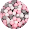 A pile of colorful balls in a round container. Anteprima dell’immagine prodotto