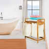 A bathroom scene with a bathtub, a laundry basket, and towels. Anteprima dell’immagine prodotto