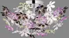 A close-up view of a decorative ceiling lamp with multiple colorful flower-shaped acrylic glass elements attached to a chrome base. Náhled obrázku produktu