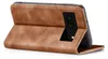 A brown flip case for a Google Pixel phone is shown from the side, with the phone partially inserted. Produktbild-Vorschau