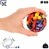 A hand holding a small, round lid with a fruit pattern. There are also diagrams and text overlays indicating dimensions and quantity. Podgląd zdjęcia produktu