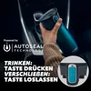 A hand holding a teal Contigo travel mug inside a car. Náhľad obrázku produktu