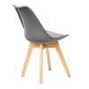 A single dark gray chair with wooden legs is shown from a side angle against a white background. Náhľad obrázku produktu