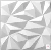 A white, geometric, 3D wall panel. Náhled obrázku produktu