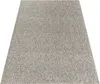 A rectangular rug with a textured, speckled gray pattern is shown from a slightly elevated, diagonal angle on a white background. Produktbild-Vorschau
