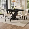 A dining room scene with a black marble-patterned extendable dining table and four beige upholstered chairs. Anteprima dell’immagine prodotto