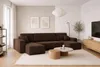 A modern living room with a large sectional sofa. Produktbild-Vorschau