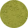 A close-up view of green powder, likely matcha, filling a circular frame. Produktbild-Vorschau