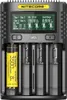 A Nitecore UMS4 battery charger with one battery inserted. Podgląd zdjęcia produktu