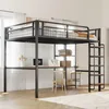 A loft bed with a desk and shelves underneath, set up in a room with natural light. Náhled obrázku produktu