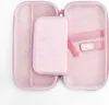 An open pink case with mesh pockets and elastic straps. Produktbild-Vorschau