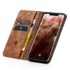A brown leather flip case for a smartphone, open to reveal the phone screen and card slots. Produktbild-Vorschau