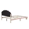 A pink bed frame with a black scalloped headboard is shown from the side against a white background. Náhled obrázku produktu