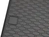 A close-up view of a black rubber car trunk liner with a hexagonal pattern. Produktbild-Vorschau