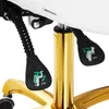 Close-up of the control levers and gold base of an office chair. Produktbild-Vorschau