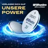 Two lithium coin cell batteries are shown with glowing blue energy effects around them against a dark, starry background. Produktbild-Vorschau