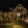 A house decorated with string lights for Christmas. Náhled obrázku produktu
