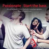 A group of friends are enjoying music together, with one person holding a small, colorful speaker. Produktbild-Vorschau