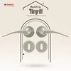 A marketing image showcasing a door handle set with two handles and two keyhole escutcheons, presented within an arched frame. Produktbild-Vorschau