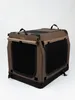 A brown and black fabric dog crate is shown against a white background. Produktbild-Vorschau