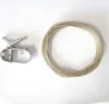 A metal clamp and a coil of wire are laid out on a white background. Produktbild-Vorschau