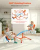Two children are playing on a rotating seesaw in a bright, modern living room. Náhled obrázku produktu
