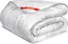 A folded white comforter with a gray floral pattern and a red brand tag. Podgląd zdjęcia produktu