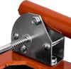 A close-up view of a metal bracket and an orange tube, likely part of a larger piece of equipment. Podgląd zdjęcia produktu