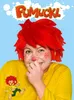 A person wearing a red wig and yellow shirt, with the Pumuckl logo above. Náhľad obrázku produktu