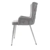 A side view of a gray upholstered chair with silver legs. Podgląd zdjęcia produktu