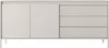 A front view of a beige sideboard with two doors and three drawers, set against a white background. Produktbild-Vorschau